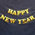 Golden Happy New Year letter banner with shiny metallic finish for holiday party decor - Happy New Year (With Ribbon)