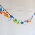 Vibrant space themed paper banner with astronaut and rocket designs for kids birthday parties - Astronaut Rocket Spacecraft Style