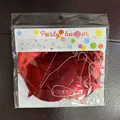 Red metallic star and circle garland in retail packaging for festive party decoration - Full Mirror Red Stars And Circles
