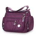 Bolso bandolera de nailon púrpura impermeable para mujer con múltiples cremalleras y correa - Morado