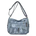 Bolso bandolera vintage azul lavado con múltiples cremalleras y correa ajustable - Azul