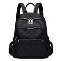 Black nylon waterproof backpack for women with quilted diamond pattern and multi-pocket design - Black