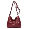 Women's large wine red crossbody bag in soft washed leather with heart pattern - Red