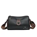 Minimalist black lychee leather crossbody bag with brown straps and kangaroo metal logo - Black