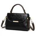 Zwarte leren crossbody tas met bruine handvaten en witte contrasterende stiksels - Zwart