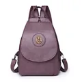 Minimalist purple lychee grain PU leather backpack with vintage bronze round emblem - Purple