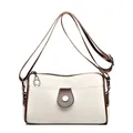Contrast color crossbody bag in cream and brown leather with wide retro patterned strap - White