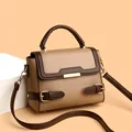 Chic two-tone khaki and brown faux leather handbag with elegant gold metal buckle detail - One Size / Khaki
