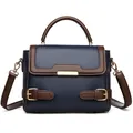 Navy blue and brown contrast crossbody bag in pebble leather with gold buckle detail - Blue