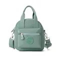 Bolso bandolera de nailon verde menta con correa ancha y detalle de logotipo circular - Verde