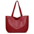 Large burgundy tote bag in premium faux leather with practical front pocket design - Red