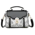 Retro Chinese style crossbody bag with wave pattern fabric and gold metal lock - Black