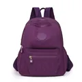 Casual purple nylon backpack for women with multi-pocket design and water-resistant finish - Purple