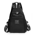Klassischer schwarzer Oxford-Rucksack für Damen mit Doppelreißverschluss und Silberdetails - Schwarz
