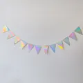 Macro view of iridescent laser triangle bunting banner for disco party decorations - Iridescent Silver Triangle Buntings