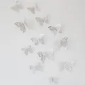 Detailed 3D hollow butterfly wall stickers in silver metallic finish on a white background - Silver