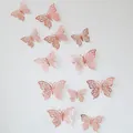 Detailed view of rose gold hollow butterfly wall stickers with 3D laser-cut vine patterns - Rose Gold Style 1