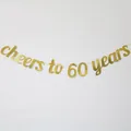 Detail of glittery gold 'Cheers to 60 Years' banner for anniversary party decoration - 60 Years Style / Gold