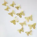 Detail of 3D gold hollow butterfly wall stickers with metallic texture for home decor - Gold Style 1