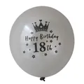 Close-up of grey 18th birthday balloon with crown and star prints for party decor - 18th Birthday (Silver Ball Black 18th) / Silver