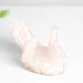 Pink quartz crystal shards embedded in a hand-shaped resin base for home decoration - Rose Quartz