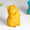Adorable yellow crystal resin cat figurine with textured amber-like finish - Citrine
