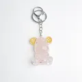 Pink translucent resin bear keychain with glitter flakes and gold gear ear accents - Rose Quartz