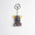 Purple crystal resin bear keychain with clock gears and gold foil interior details - Light Amethyst Style