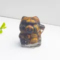 Detailed view of Maneki Neko figurine with natural tiger eye crystal stone resin texture - Tiger's Eye