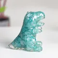 Lake blue dinosaur sculpture filled with natural crystal stones and resin finish - Aquamarine