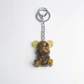 Tiger eye crystal stone bear keychain with resin finish and golden gear ear accents - Tiger Eye