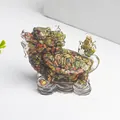 Detailed macro view of crystal dragon turtle resin craft with colorful stone inlay - Unakite