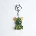 Green resin bear keychain with gold gears and foil flakes for bags or cars - Green Glaze Style