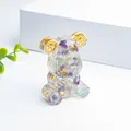 Resin bear statue with purple amethyst crystals, gold foil, and metal gears inside - Colorful Fluorite