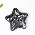 Bandeja de resina en forma de estrella con piedras negras y copos de oro - Obsidiana