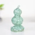 Light green resin gourd ornament with natural crystal stone filling on white background - Rotating Style / Revolving Aquamarine