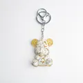 White crystal resin bear keychain with gold foil and gear ears on white background - White Turquoise