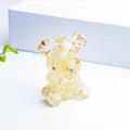 Sitting bear resin statue filled with yellow natural crystals and gold leaf flakes - Lemon Yellow