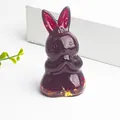Deep purple resin rabbit figurine with gold foil flakes and prayer gesture - Red Glass and Gold Foil