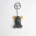 Green and black crystal stone resin bear keychain with gold gears and silver lobster clasp - Anyolite Style