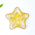 Bandeja para joyas en forma de estrella de resina con elegantes copos de oro - Citrino
