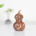 Resin Wu Lou figurine filled with colorful natural crystals for home decoration - Red Agate
