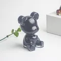 Figurine d'ours noir brillant en résine avec cristaux d'améthyste naturelle - Obsidienne