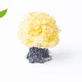 Citrine crystal tree ornament with yellow stones and a black rock base for desk decor - Topaz