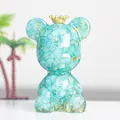 Bärenfigur aus türkisfarbenem Harz mit Krone und Blattgold für die Dekoration - Aquamarin Stil
