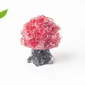 Miniature red crystal money tree desktop ornament with black stone base on white background - Red Glass