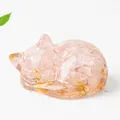 Pink crystal sleeping cat statue with gold flakes in transparent resin decor - Rose Quartz