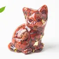 Close-up of sitting cat figurine with red crystal stones and gold foil in resin - 3.2cm x 3.3cm x 4cm / Red Jasper
