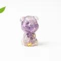 Macro shot of purple crystal resin schnauzer figurine with elegant gold foil flakes - Dreamy Purple