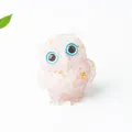 Pink natural crystal owl figurine with gold foil accents and large blue eyes - Rose Quartz